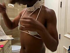 Ana Foxxx, a black MILF, pleasures herself with her fingers at home