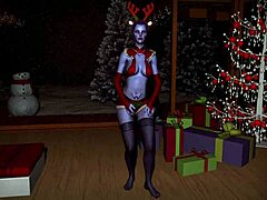 Janda seksi menari dengan sensual di kamar tidur pada hari Natal