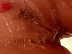 Nikki Benz's sensual solo masturbation with soapy tits
