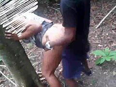 A couple enjoys outdoor sex in the jungle setting