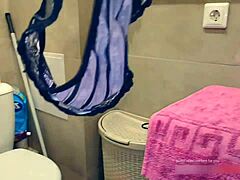 Amateur housewife masturbates in the bathroom and gets caught